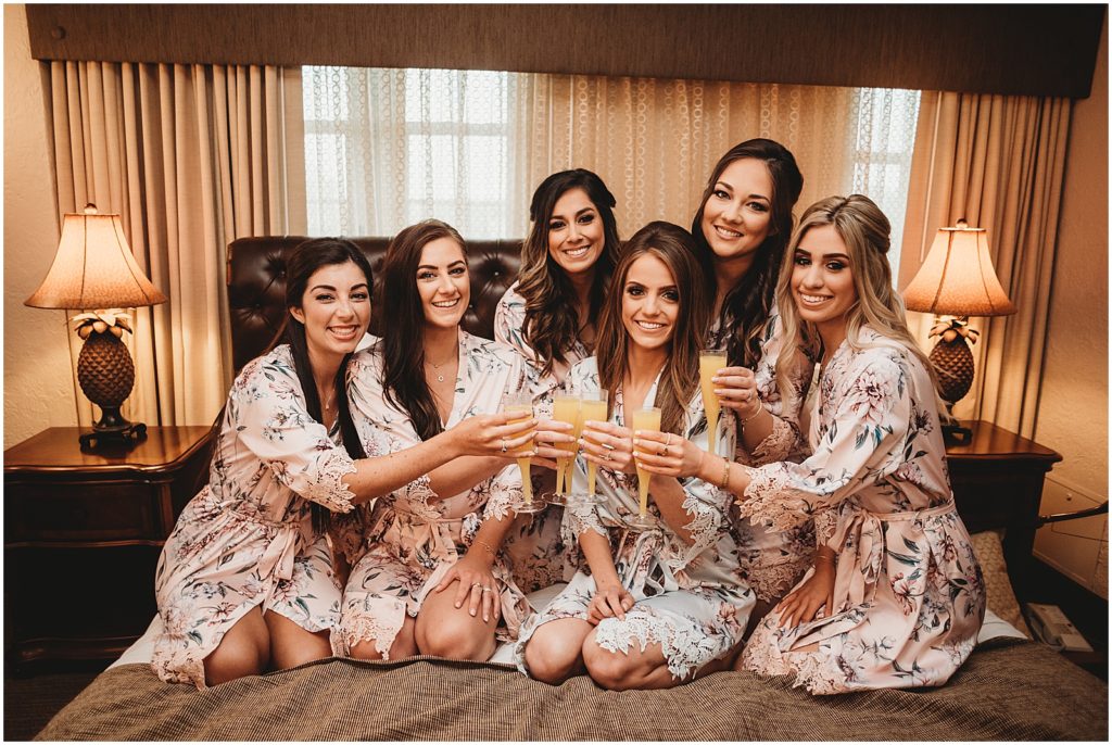bride and bridesmaids in robes, bride with mimosa, getting ready wedding photo, st charles wedding