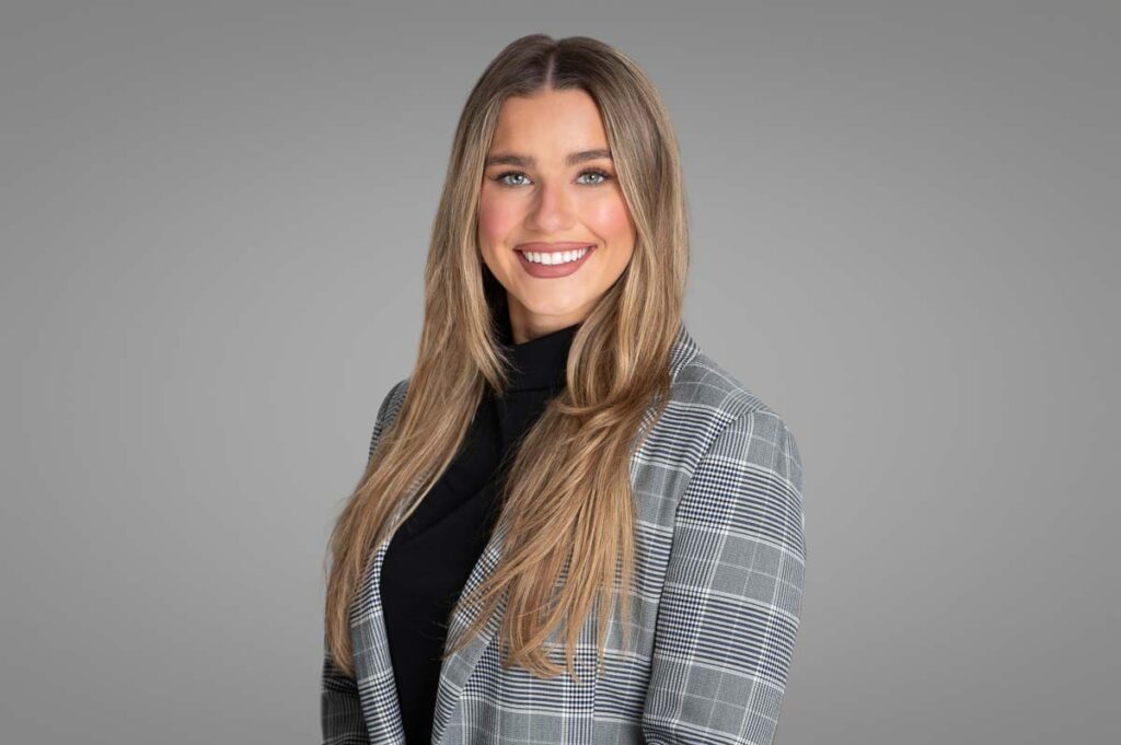 Headshot of Female Real Estate Agent in Chicago with long brown hair taken by Lisa Kay Photography