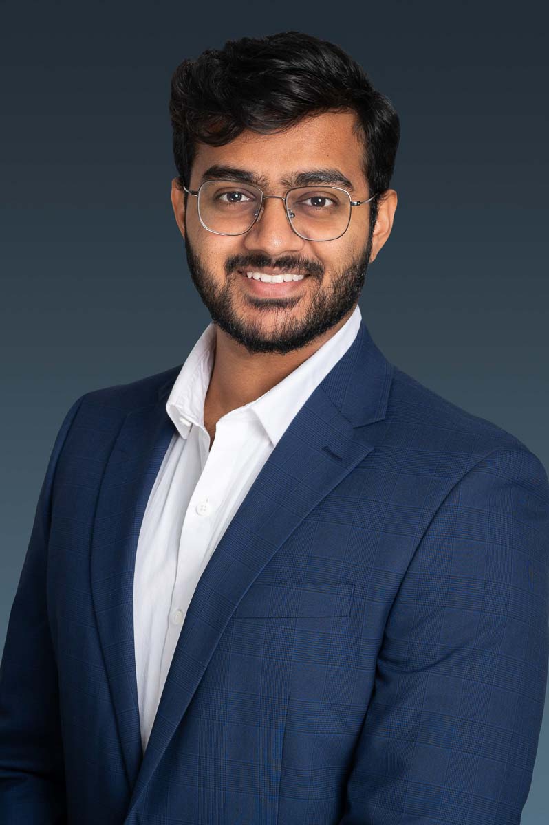 Professional Headshot of Indian Male in Blue Blazer. Photo taken by Oak Brook Headshot Photographer Lisa Kay