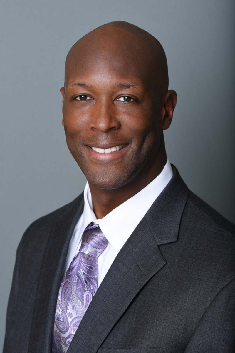 Professional Headshot of Man in Suit. Photo taken by Rosemont Headshot Photographer Lisa Kay